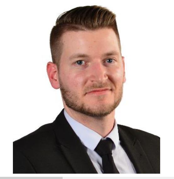 Professional headshot of Benjamin Shurtz, technical writer